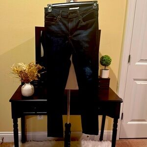 Levi’s Slimming Skinny dark wash jeans. Size 29 never worn.